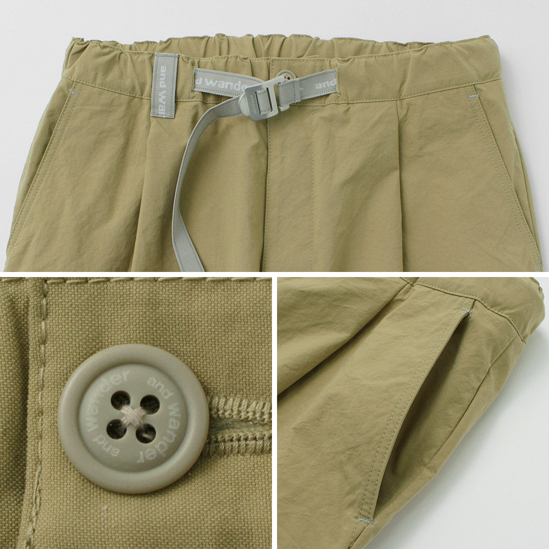 AND WANDER(アンドワンダー) ナイロンチノ タック テーパードパンツ