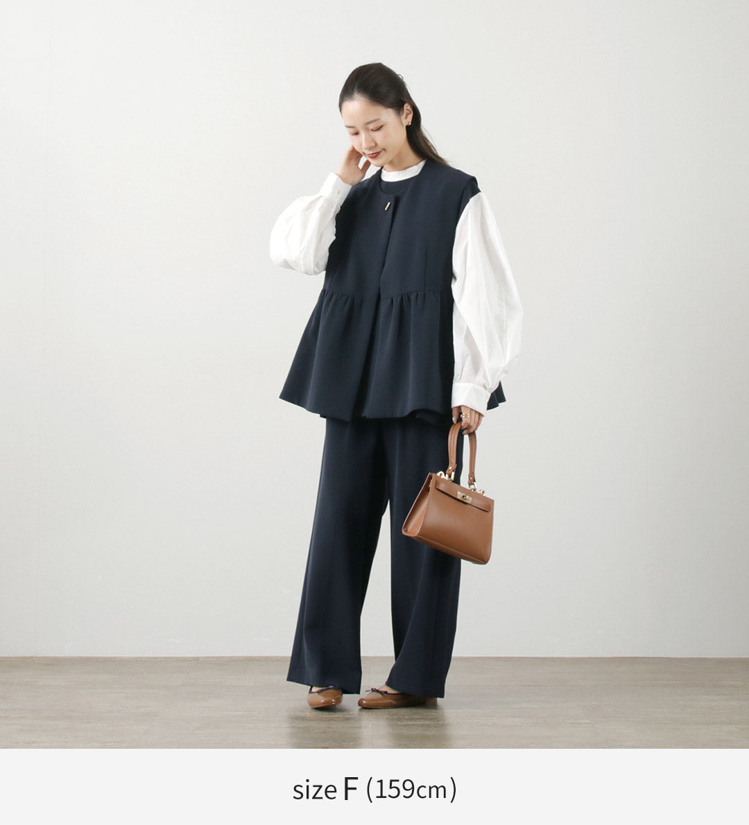 CHIGNON(シニヨン) ダブルクロス ペプラム ベスト