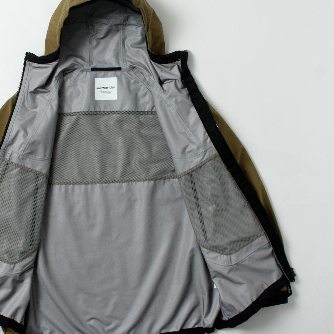 AND WANDER(アンドワンダー) ルーズフィッティング レインジャケット