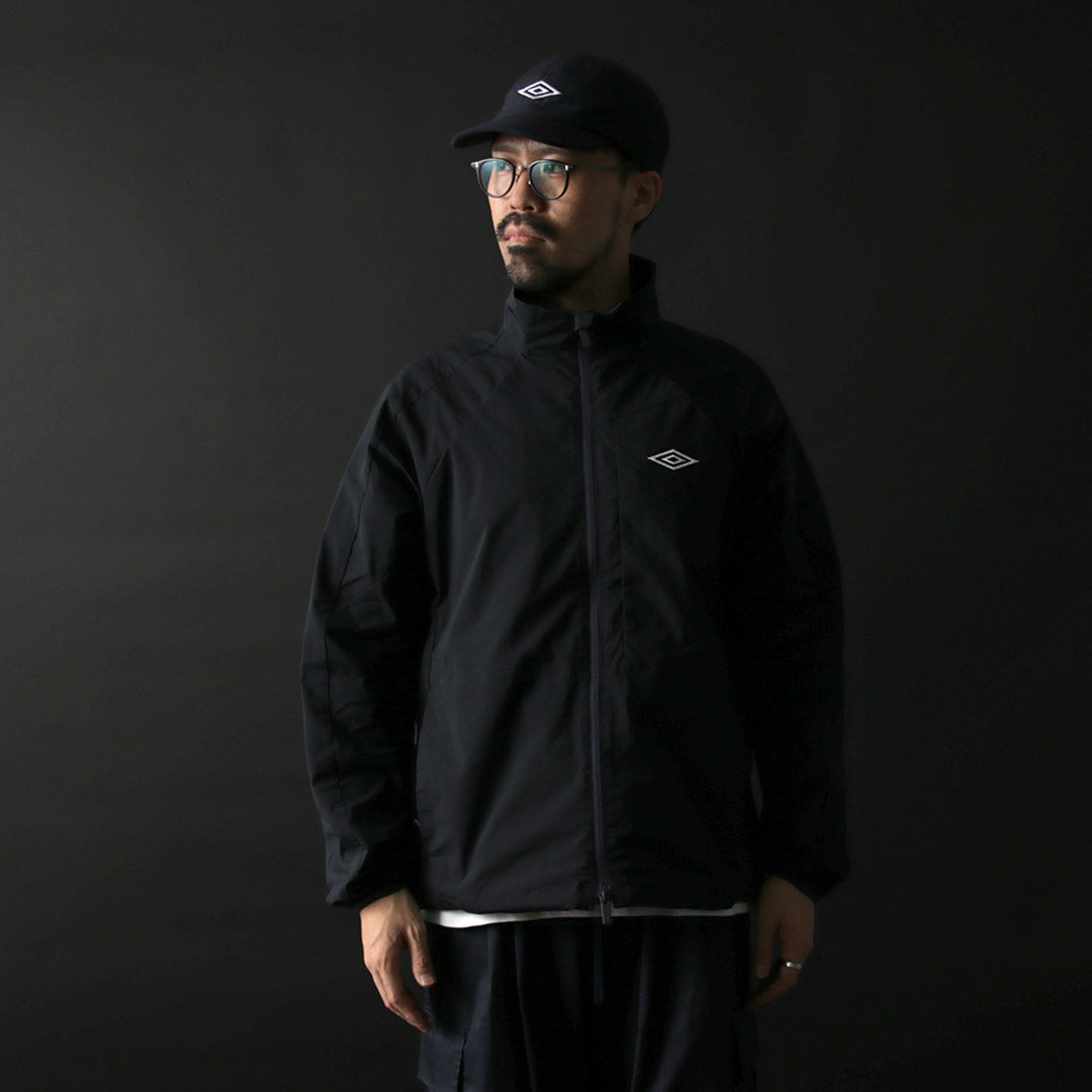 WHITE MOUNTAINEERING（ホワイトマウンテニアリング） ホワイトマウンテニアリング×アンブロ ブルゾン