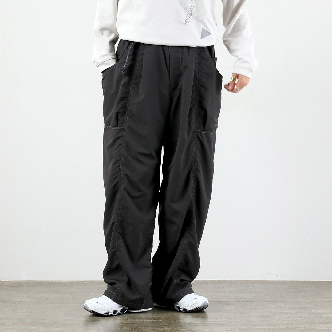 AND WANDER（アンドワンダー） クリンクル ナイロン パンツ / メンズ
